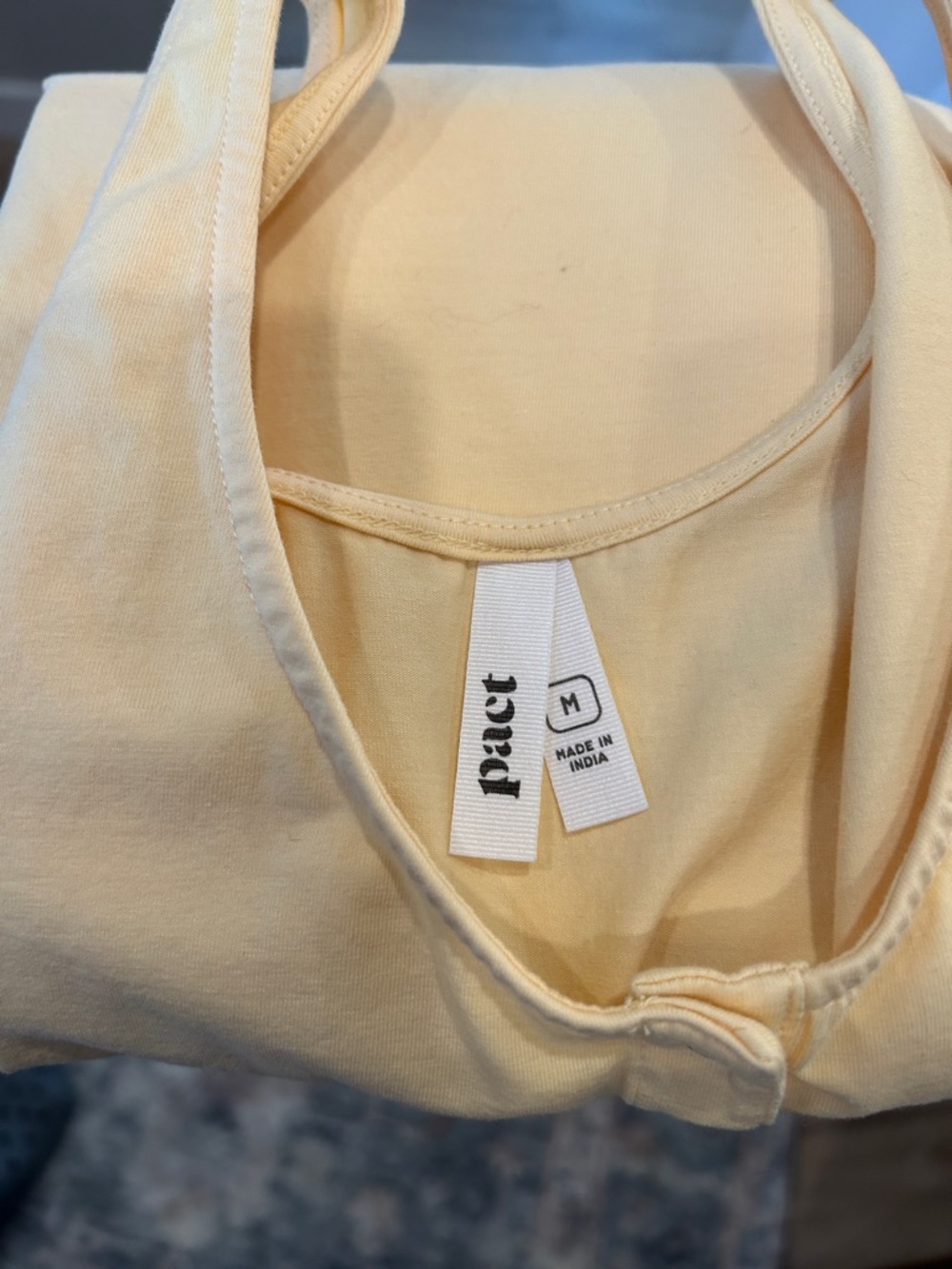 Pact Soft buttery yellow Snap-Front Tank 95% organic cotton and 5% elastane
